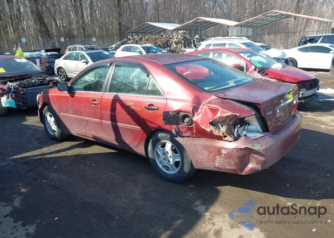 2003 Toyota Camry Le V6 z USA, uszkodzony, nr VIN 4T1BF30K23U041622